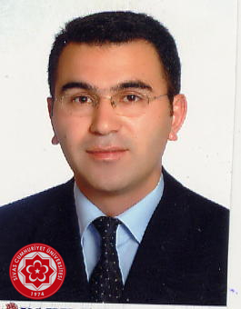 KAMİL KÖMÜRCÜ